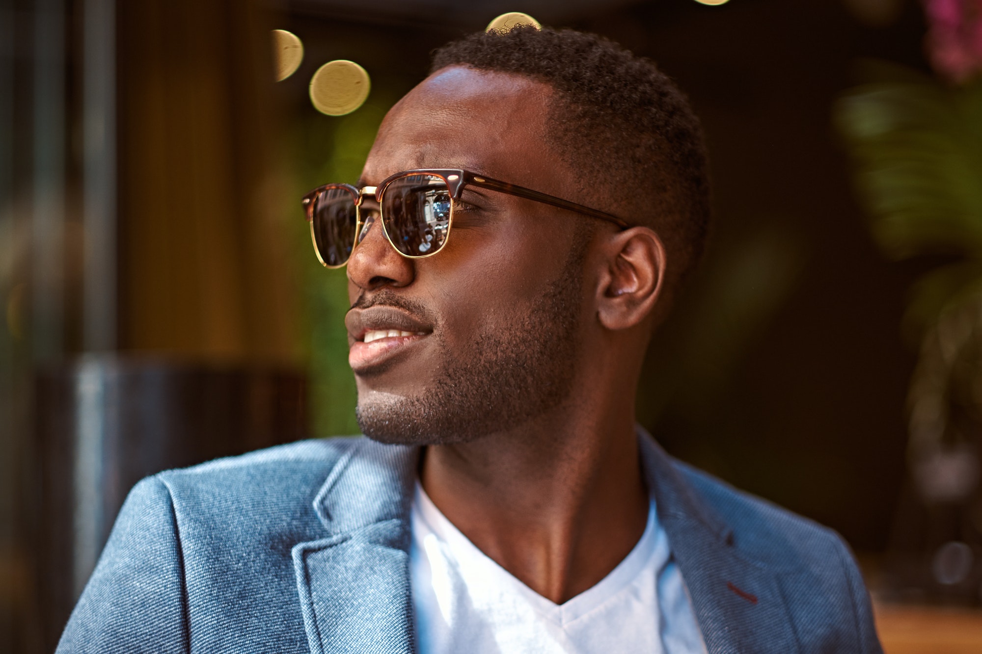 Portrait of confident businessman in sunglasses